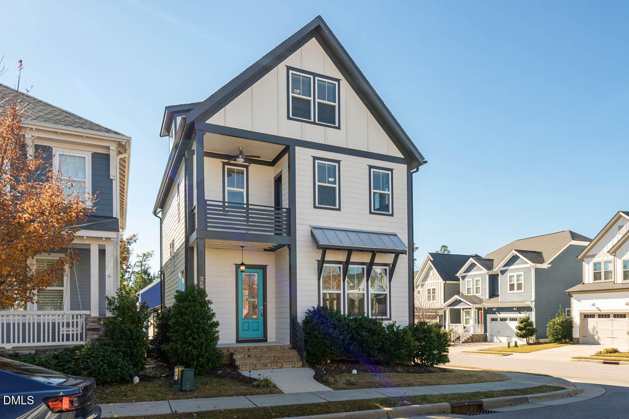 260 Quarter Gate Trace Chapel Hill, NC 27516 - Photo 41 of 68 a front view of residential houses with yard