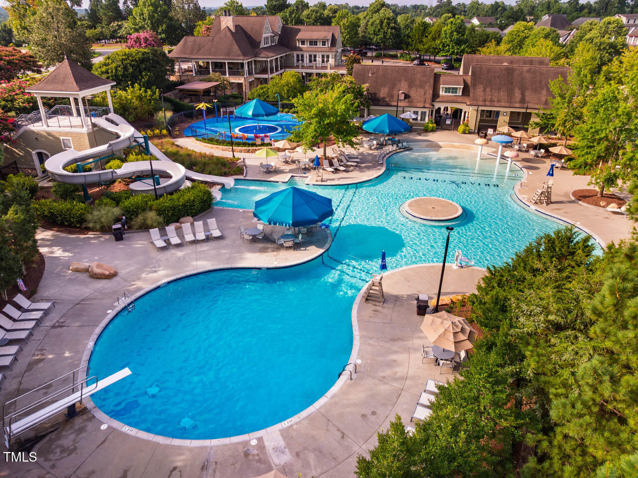 260 Quarter Gate Trace Chapel Hill, NC 27516 - Photo 46 of 68 an aerial view of a swimming pool patio and outdoor seating