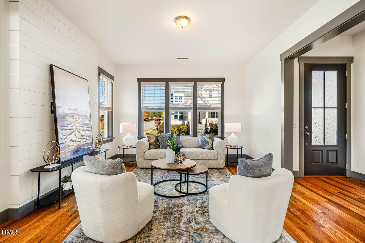 260 Quarter Gate Trace Chapel Hill, NC 27516 - Photo 7 of 68 a living room with furniture and a window