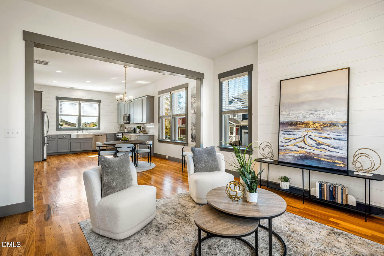 260 Quarter Gate Trace Chapel Hill, NC 27516 - Photo 8 of 68 a living room with furniture and a large window