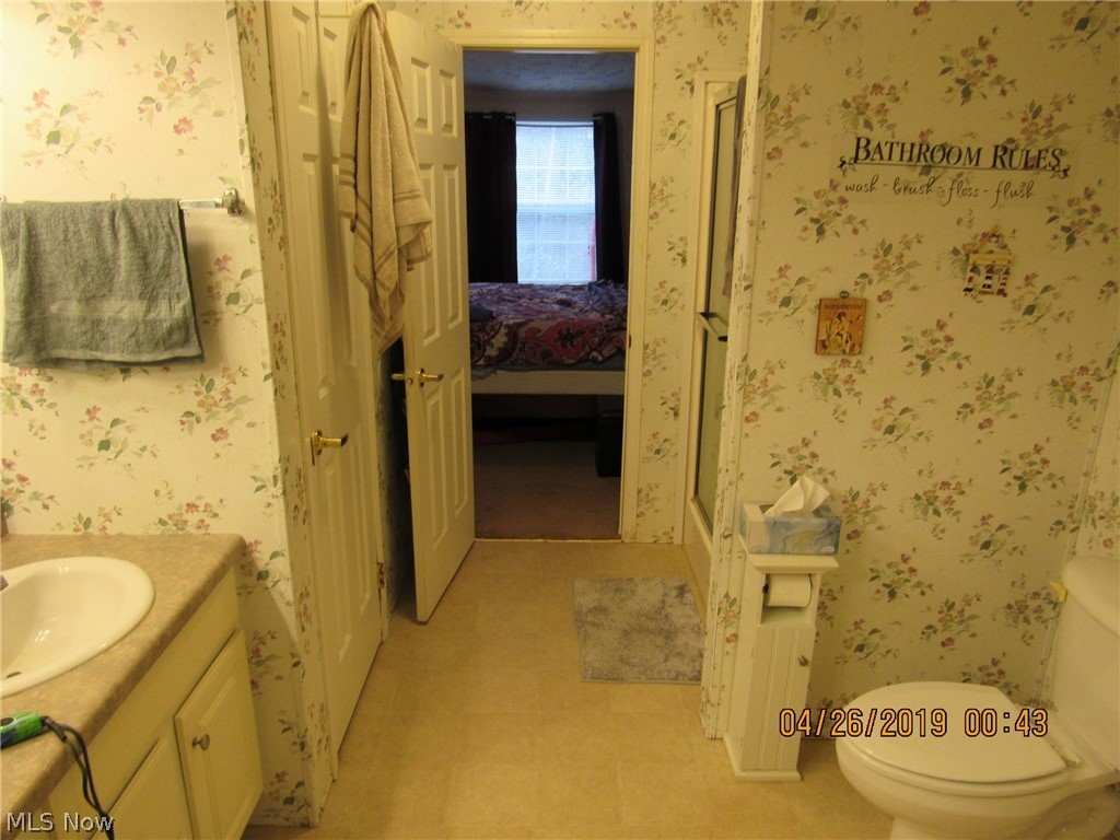 4502 Tower Road Dorset, OH 44032 - Photo 13 of 16 Master bathroom looking into master bedroom.