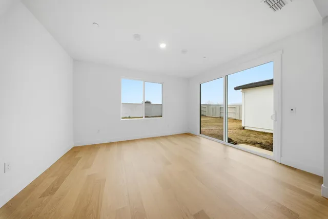 a view of kitchen with wooden floor