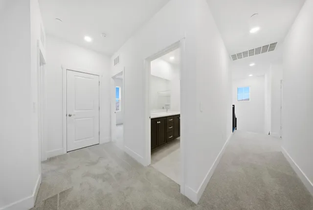 an empty room with a empty space and window