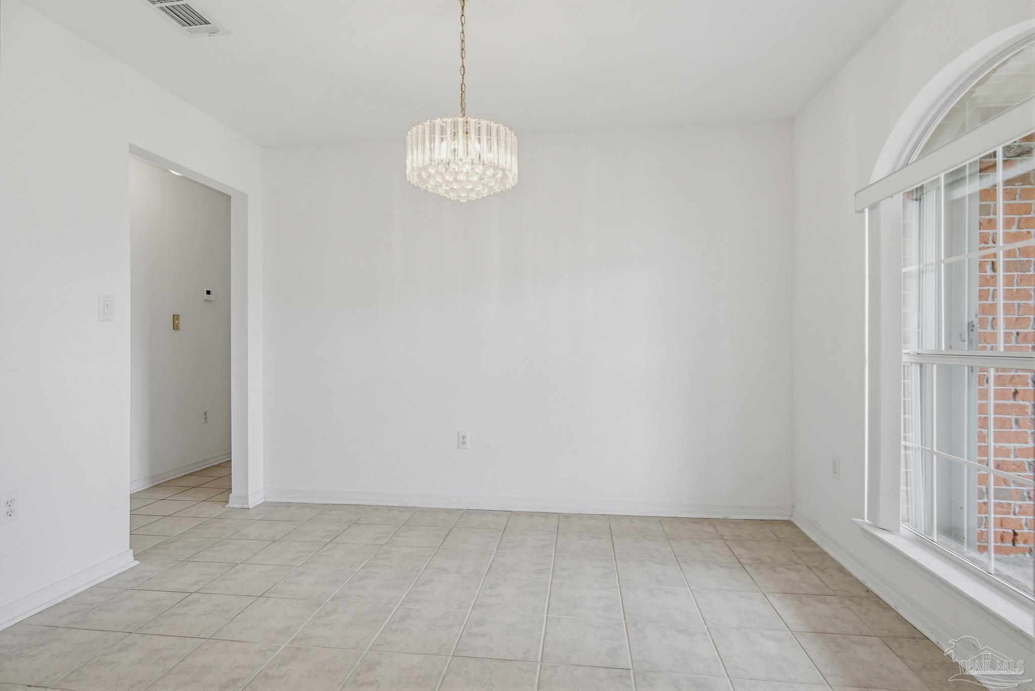 2856 Atoka Trail Crestview, FL 32539 - Photo 13 of 53 a view of an empty room with a window