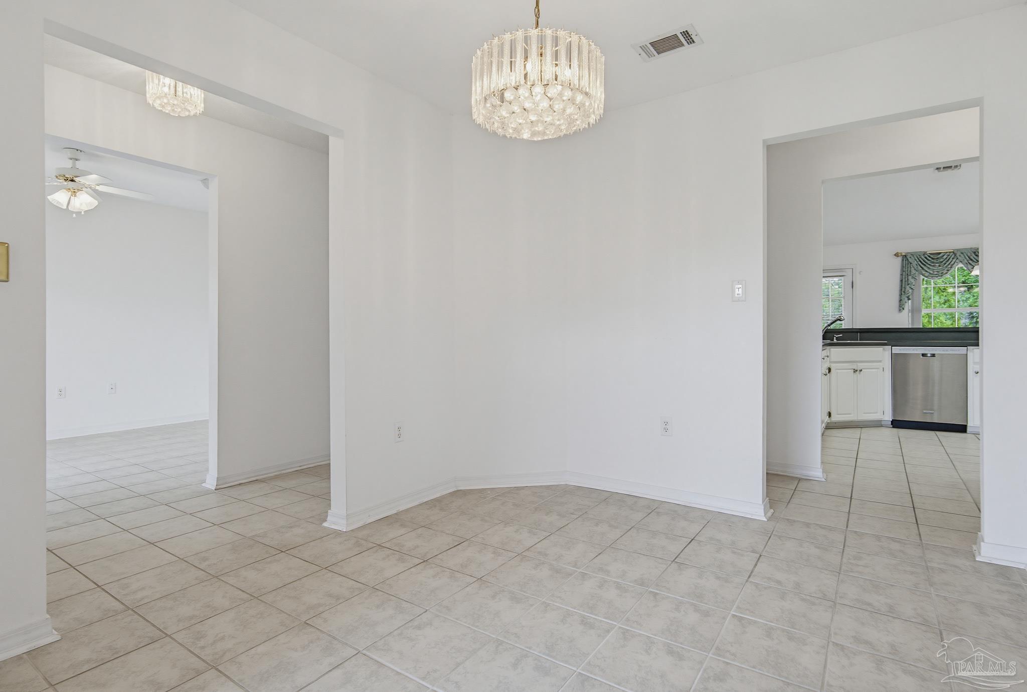 2856 Atoka Trail Crestview, FL 32539 - Photo 15 of 53 an empty room with kitchen view