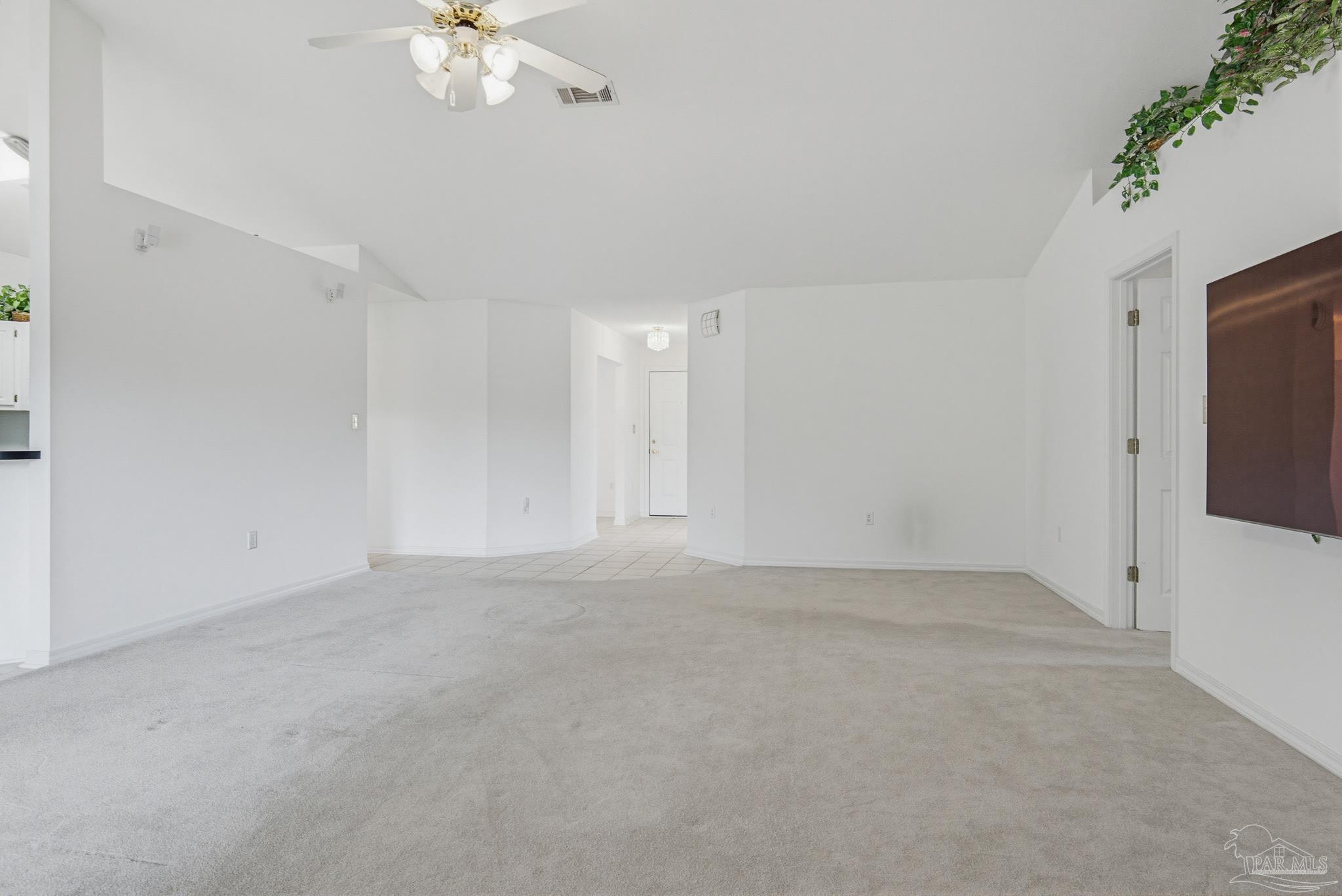 2856 Atoka Trail Crestview, FL 32539 - Photo 24 of 53 a view of an empty room with a chandelier fan