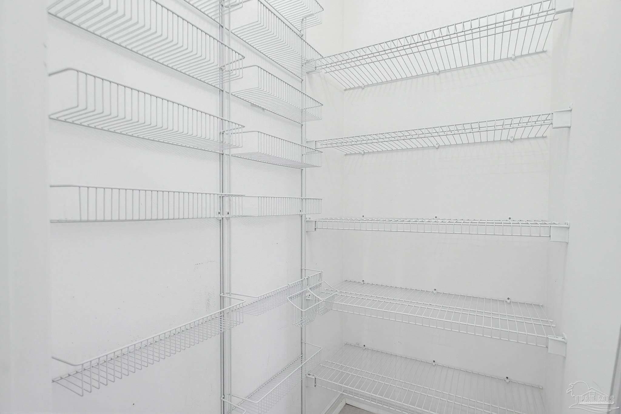 2856 Atoka Trail Crestview, FL 32539 - Photo 33 of 53 a view of a room with racks on the wall