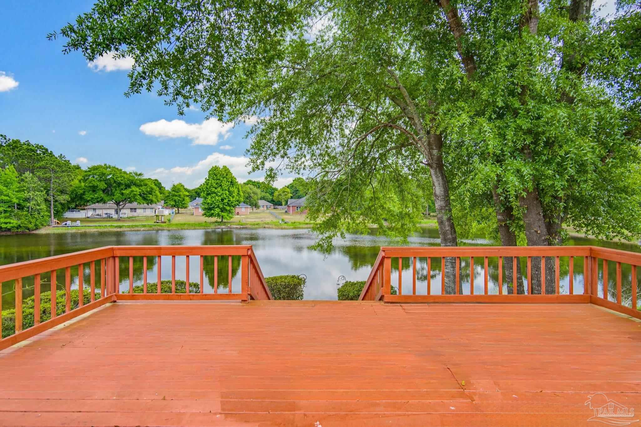 2856 Atoka Trail Crestview, FL 32539 - Photo 4 of 53 a view of a balcony with lake view