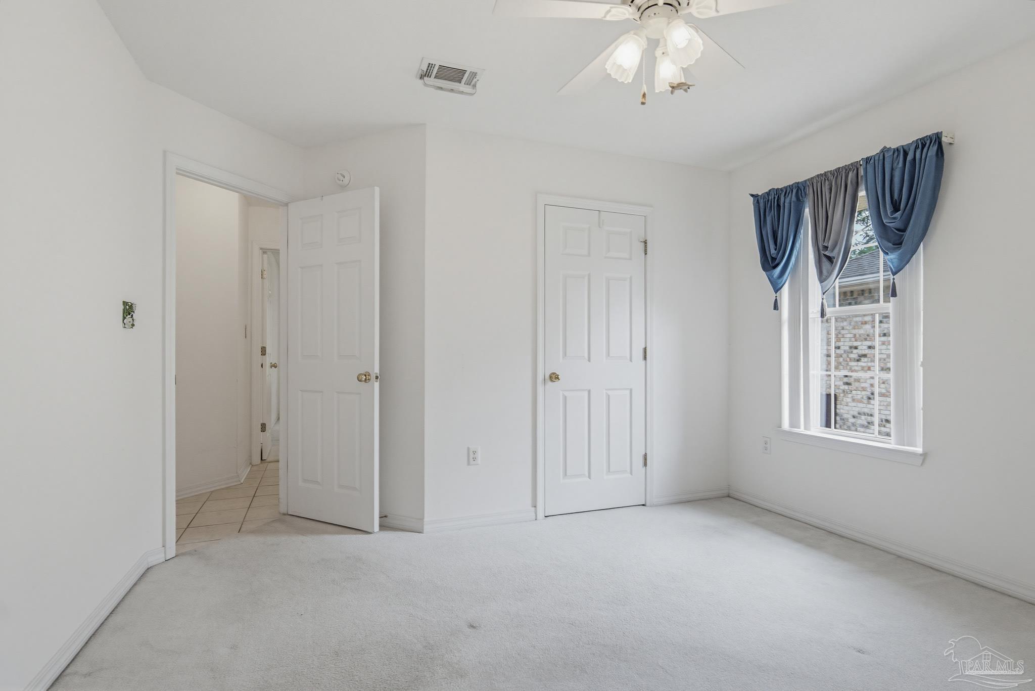 2856 Atoka Trail Crestview, FL 32539 - Photo 45 of 53 a view of an empty room with a window