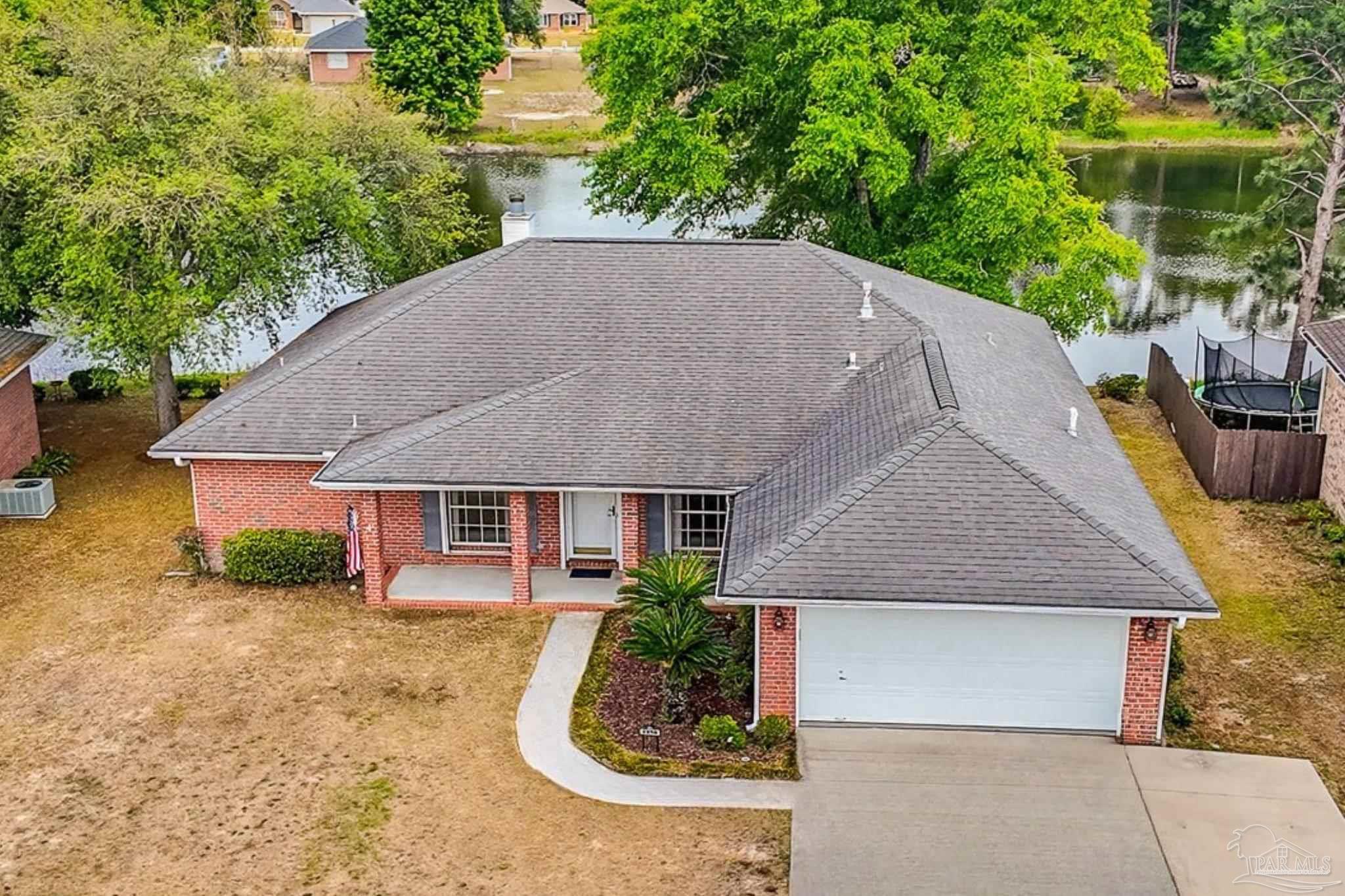 2856 Atoka Trail Crestview, FL 32539 - Photo 51 of 53 a aerial view of a house next to a yard