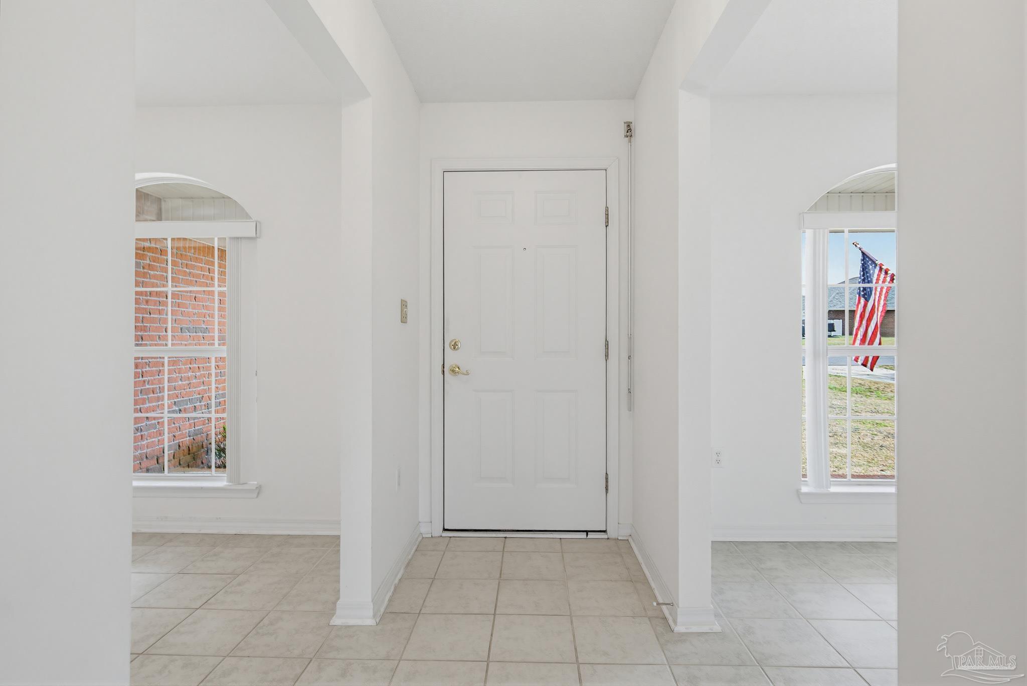 2856 Atoka Trail Crestview, FL 32539 - Photo 8 of 53 an empty room with windows and closet
