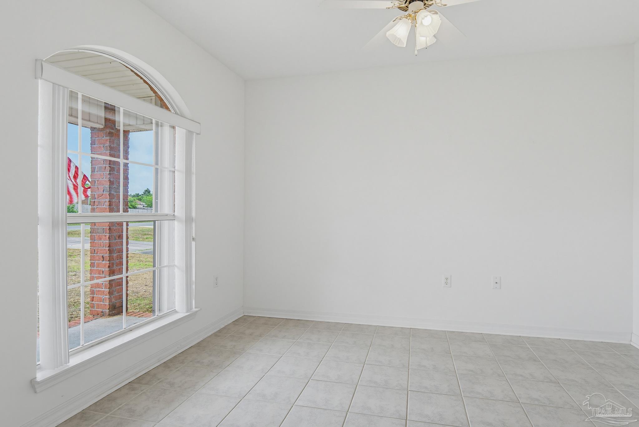 2856 Atoka Trail Crestview, FL 32539 - Photo 10 of 53 an empty room with windows