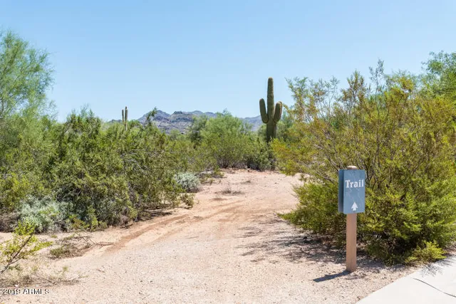 a street sign next to a road