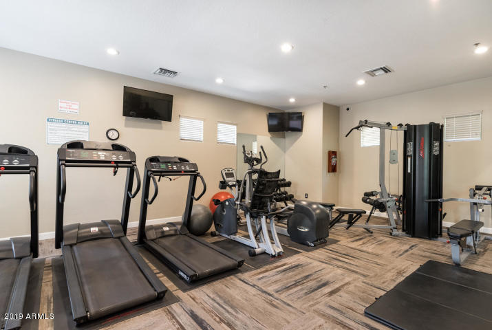 20750 North 87th Street, Unit 1123 Scottsdale, AZ 85255 - Photo 29 of 32 a view of a room with gym equipment