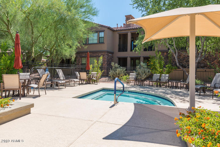 20750 North 87th Street, Unit 1123 Scottsdale, AZ 85255 - Photo 31 of 32 a view of outdoor space yard deck patio and swimming pool