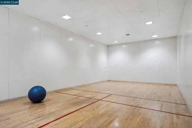 a view of a patio with table and chairs and potted plants