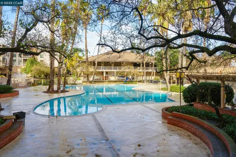 a view of a lake with a house