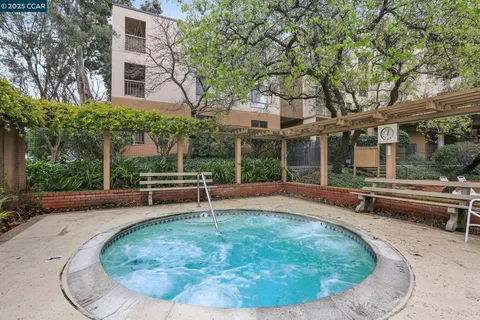 a view of a lake with a building in front of it