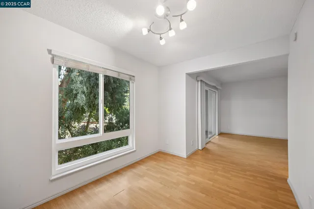 a kitchen with a sink cabinets and stainless steel appliances