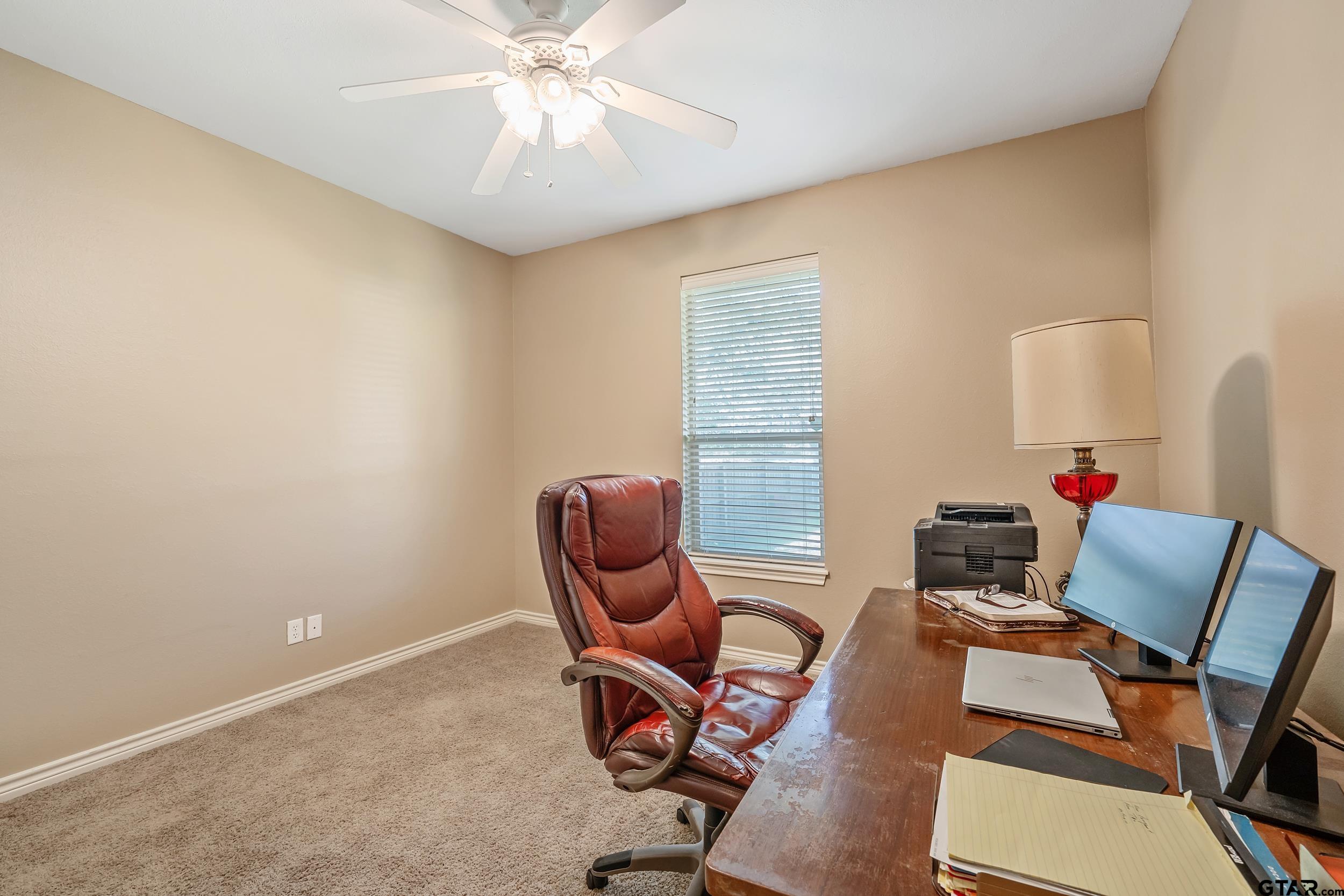 3056 Cornerstone Trail Tyler, TX 75701 - Photo 18 of 24 a living room with furniture and a wooden floor