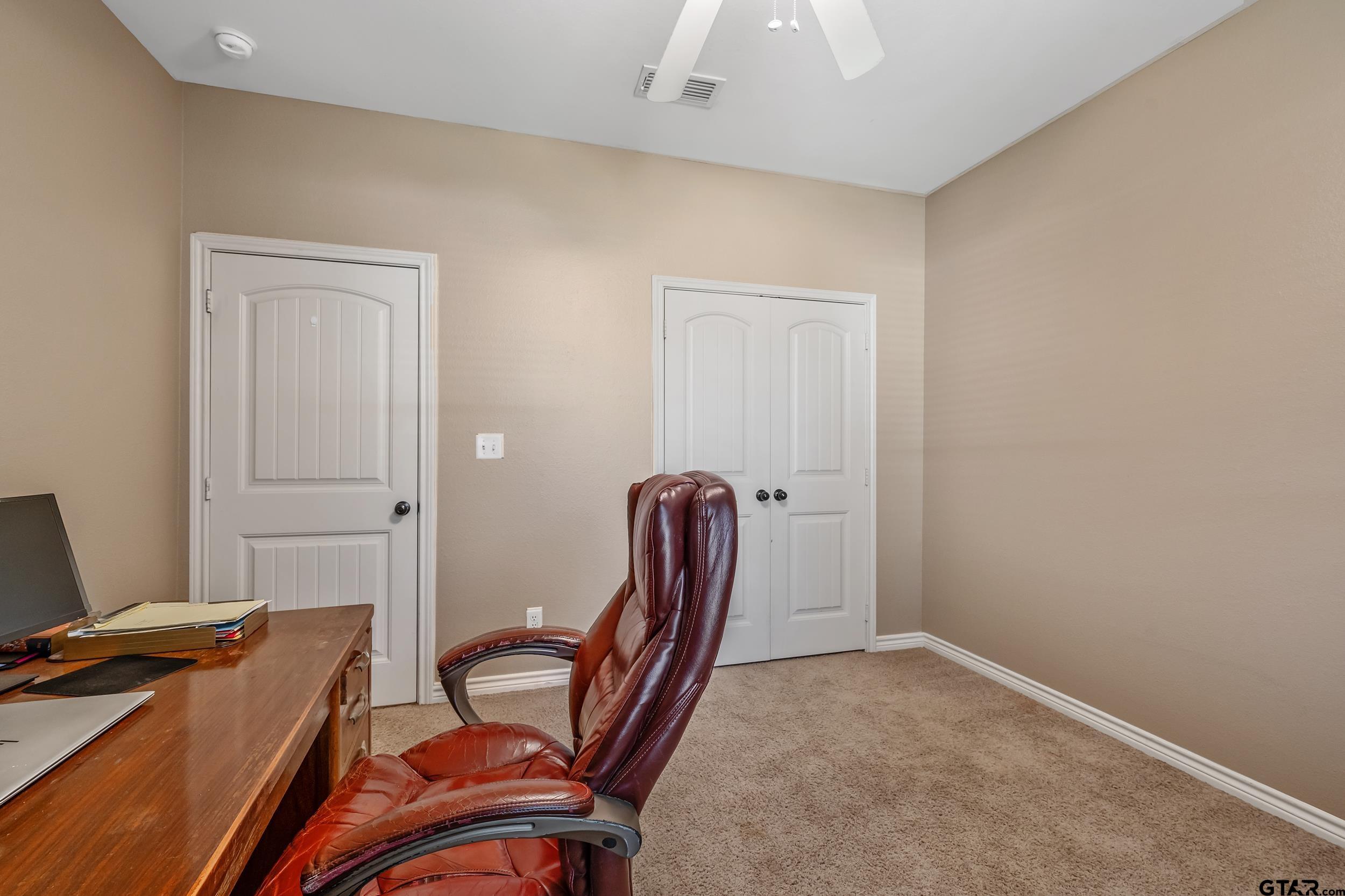 3056 Cornerstone Trail Tyler, TX 75701 - Photo 19 of 24 a room with furniture and a window
