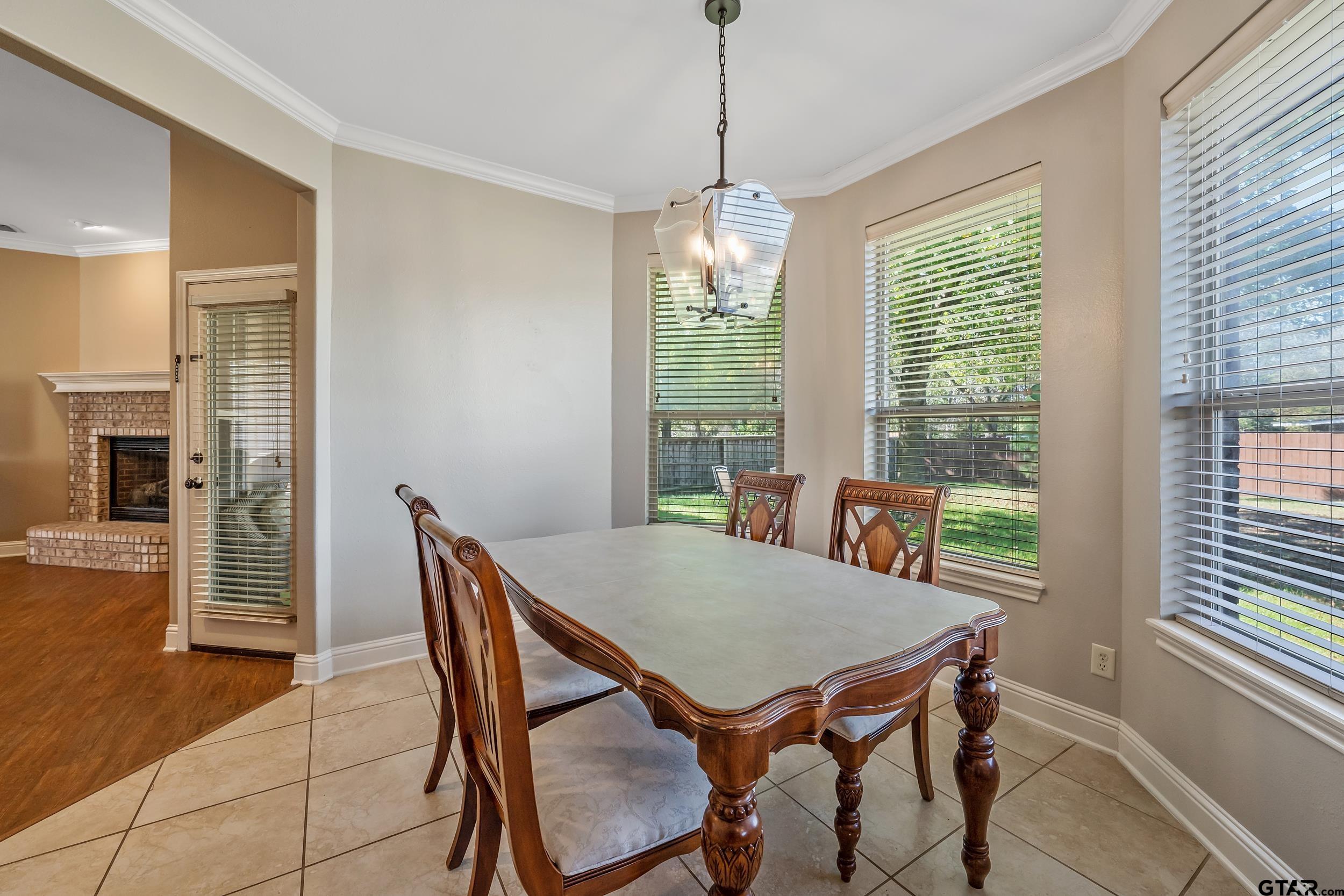 3056 Cornerstone Trail Tyler, TX 75701 - Photo 21 of 24 a view of a dining room with furniture window and outside view