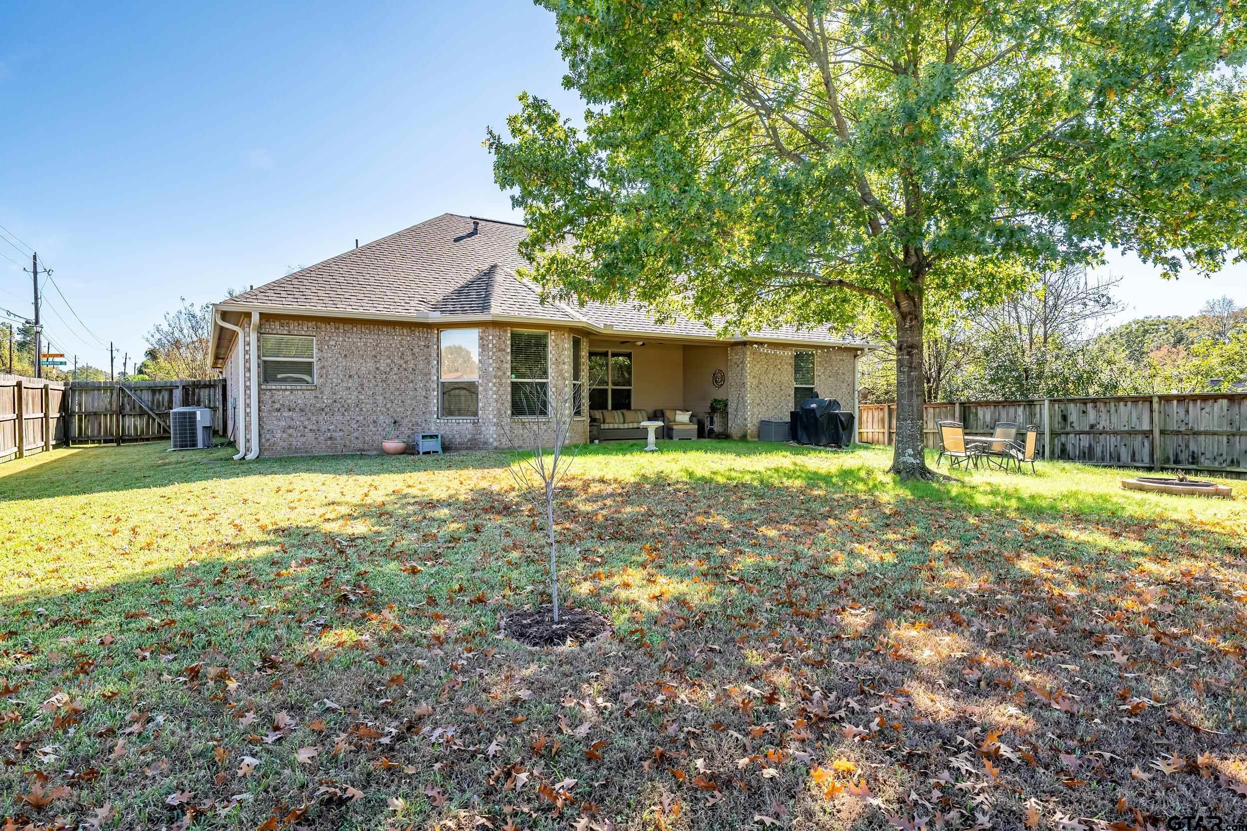 3056 Cornerstone Trail Tyler, TX 75701 - Photo 22 of 24 a view of a house with yard and tree s