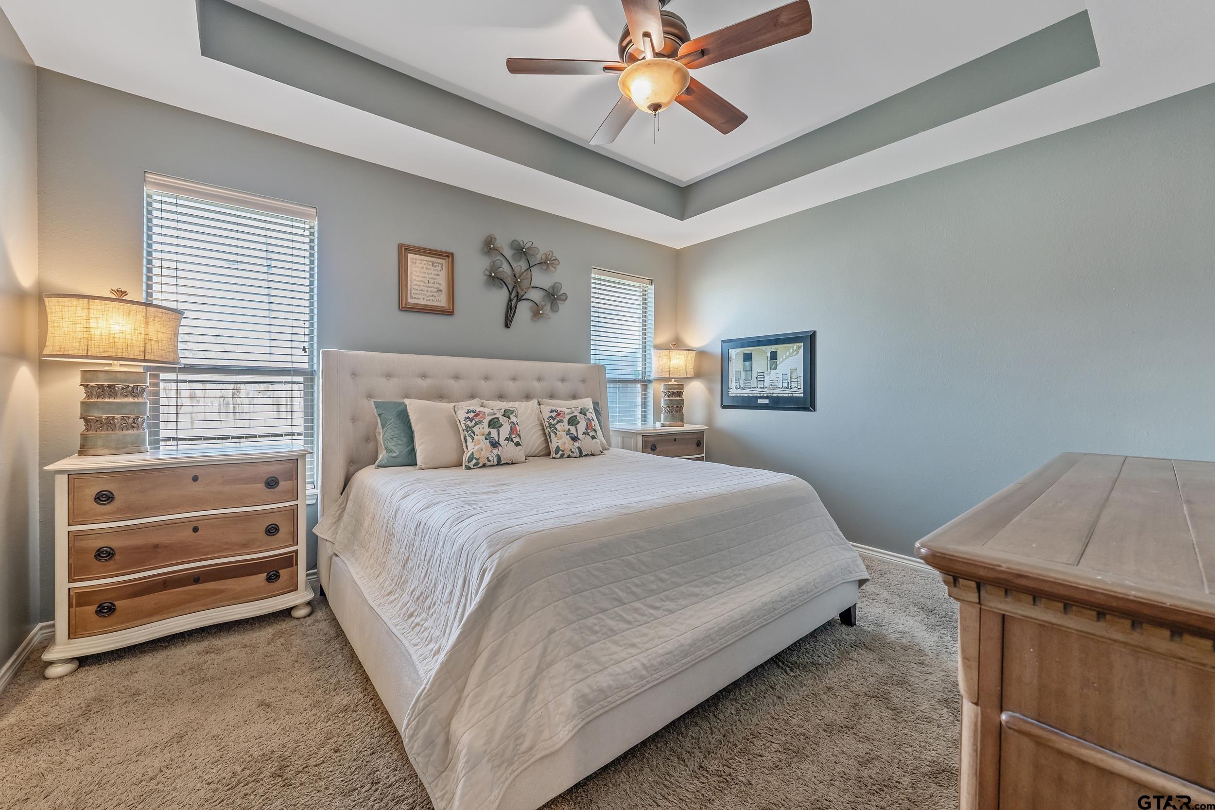 3056 Cornerstone Trail Tyler, TX 75701 - Photo 10 of 24 a bedroom with a bed and a window