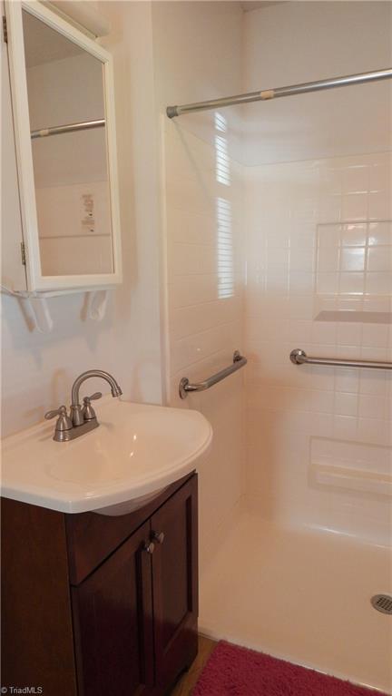 6719 Coltrane Mill Road Greensboro, NC 27406 - Photo 11 of 26 Nice vanity & medicine cabinet!