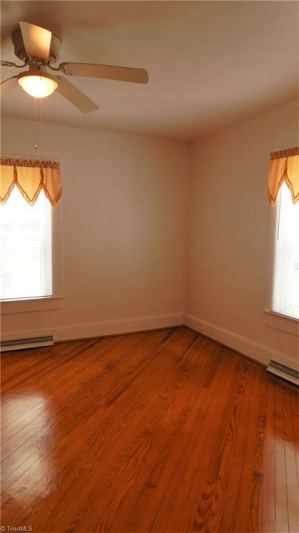 6719 Coltrane Mill Road Greensboro, NC 27406 - Photo 12 of 26 Master Bedroom w/refinished pine floors!