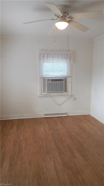 6719 Coltrane Mill Road Greensboro, NC 27406 - Photo 16 of 26 Dining Room with ceiling fan! Wood patterned vinyl flooring!