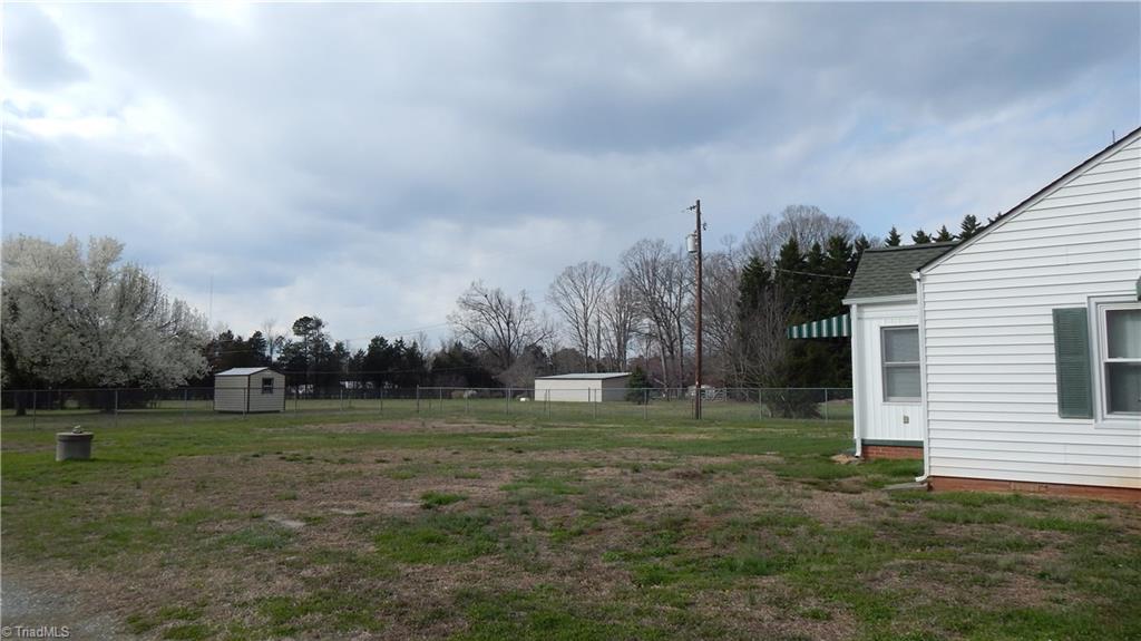 6719 Coltrane Mill Road Greensboro, NC 27406 - Photo 24 of 26 Side view of front yard!