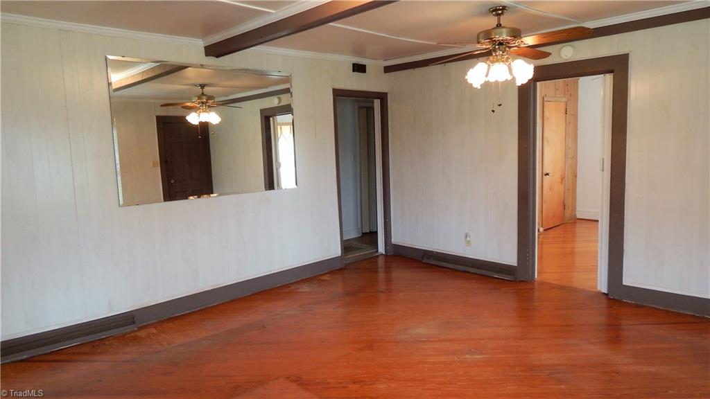6719 Coltrane Mill Road Greensboro, NC 27406 - Photo 8 of 26 Great Room with door to Master Bedroom!