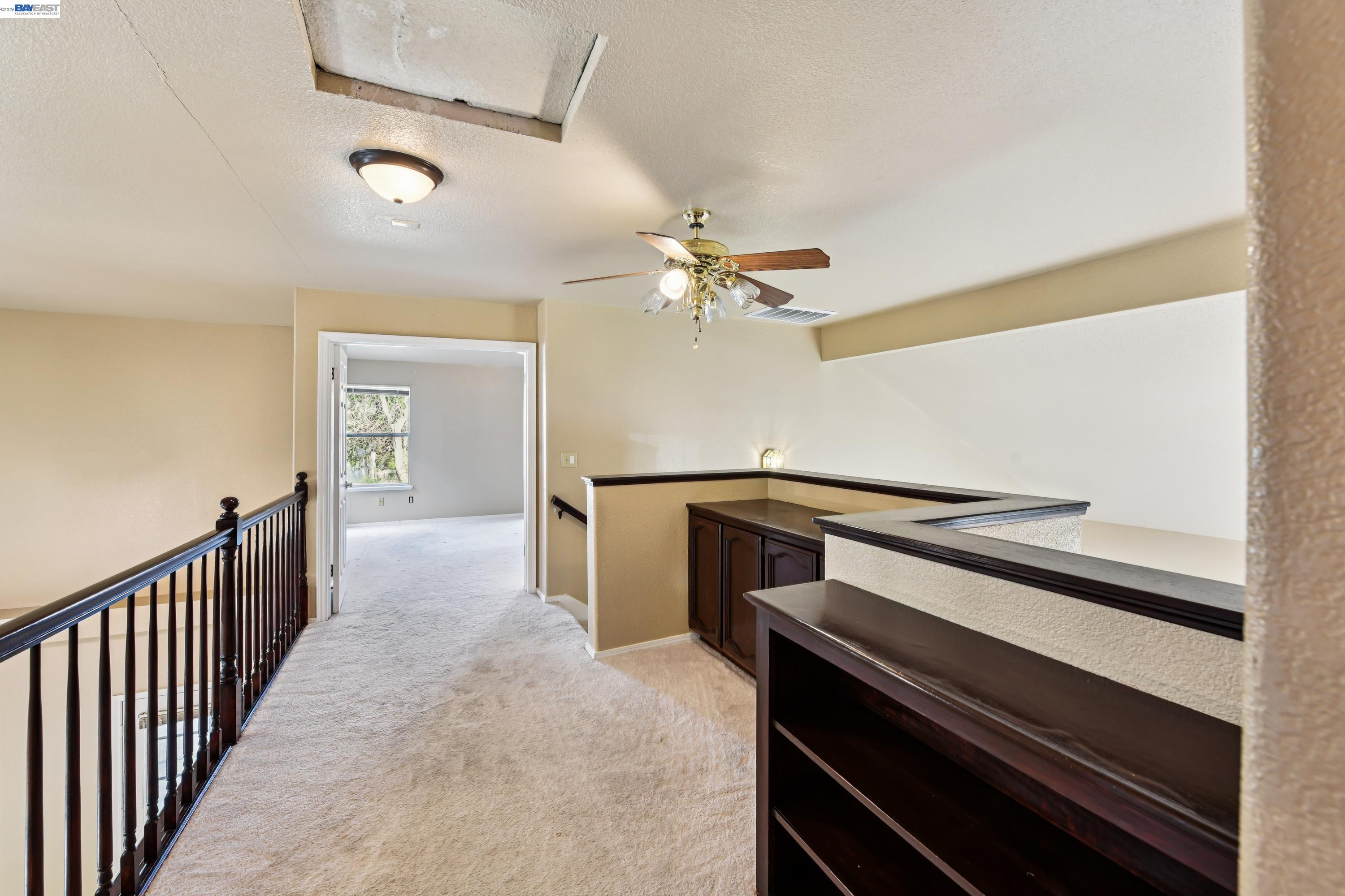 110 Conductor Way Folsom, CA 95630 - Photo 14 of 27 a view of an empty room with wooden floor