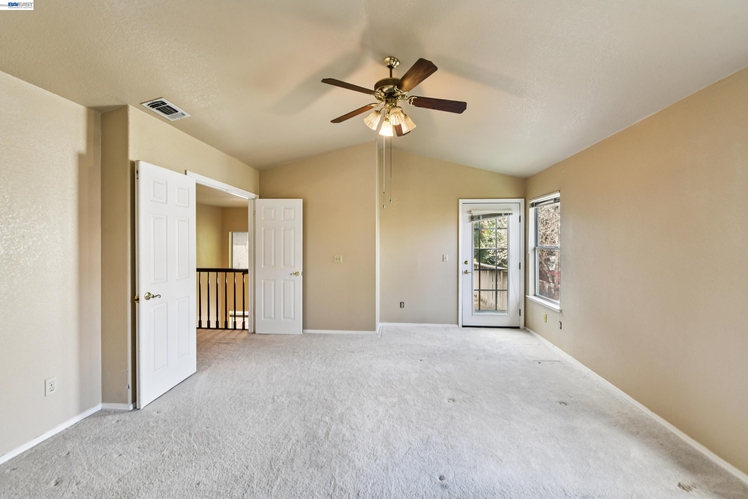 110 Conductor Way Folsom, CA 95630 - Photo 19 of 27 a view of a livingroom with a ceiling fan and window
