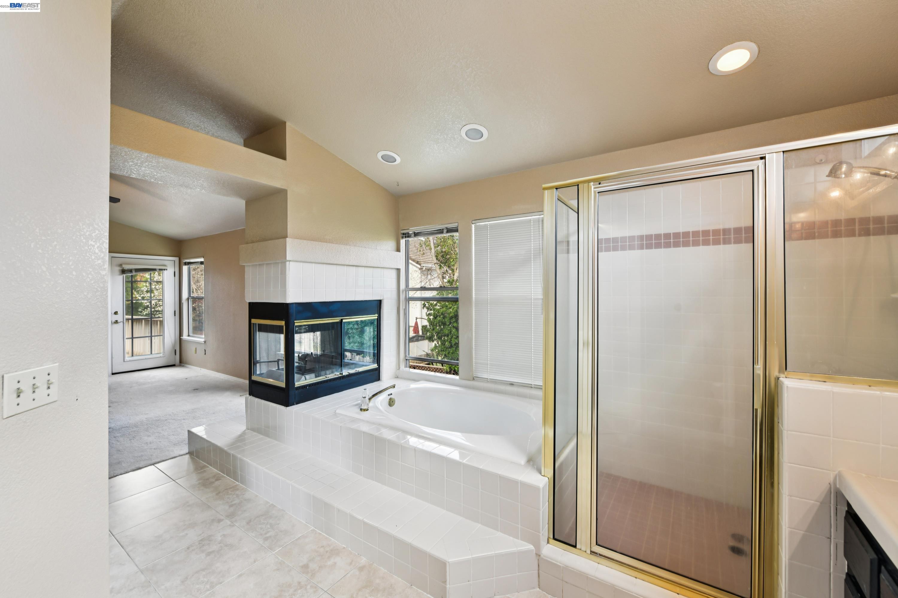 110 Conductor Way Folsom, CA 95630 - Photo 20 of 27 a view of an empty room with a fireplace and a window