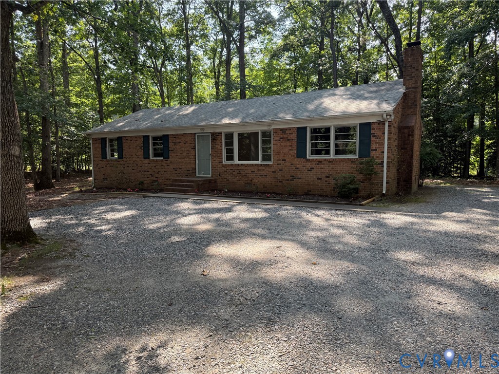 12720 Bailey Bridge Road Midlothian, VA 23112 - Photo 2 of 2 Ranch-style residence featuring a brick exterior a