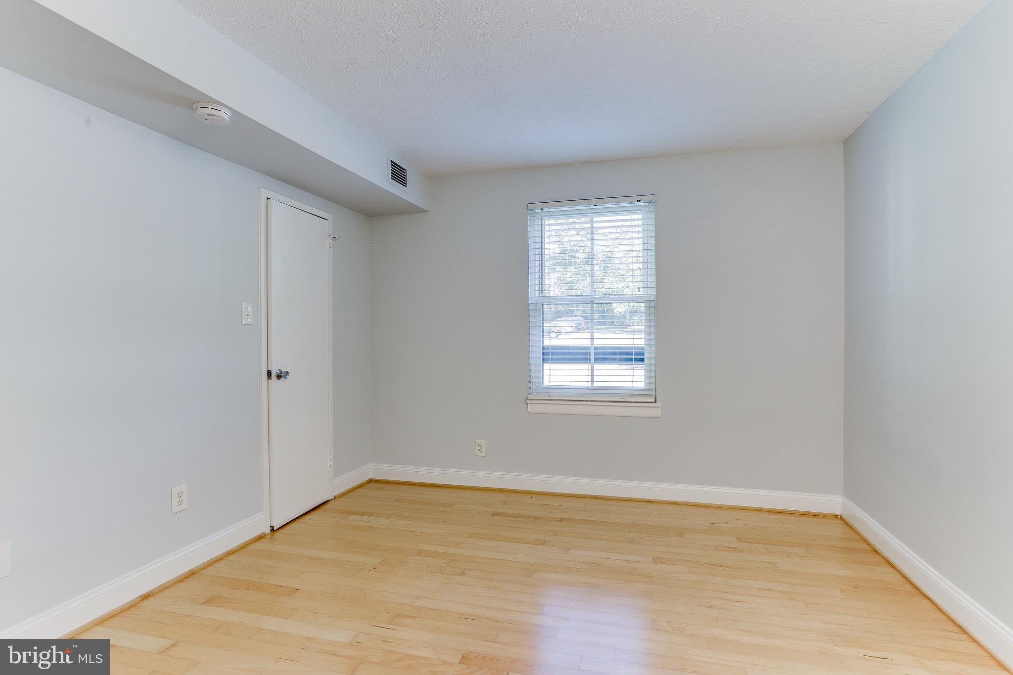 11619 Stoneview Square, Unit 2B Reston, VA 20191 - Photo 23 of 37 Master Bedroom w/ Walk-in Closet