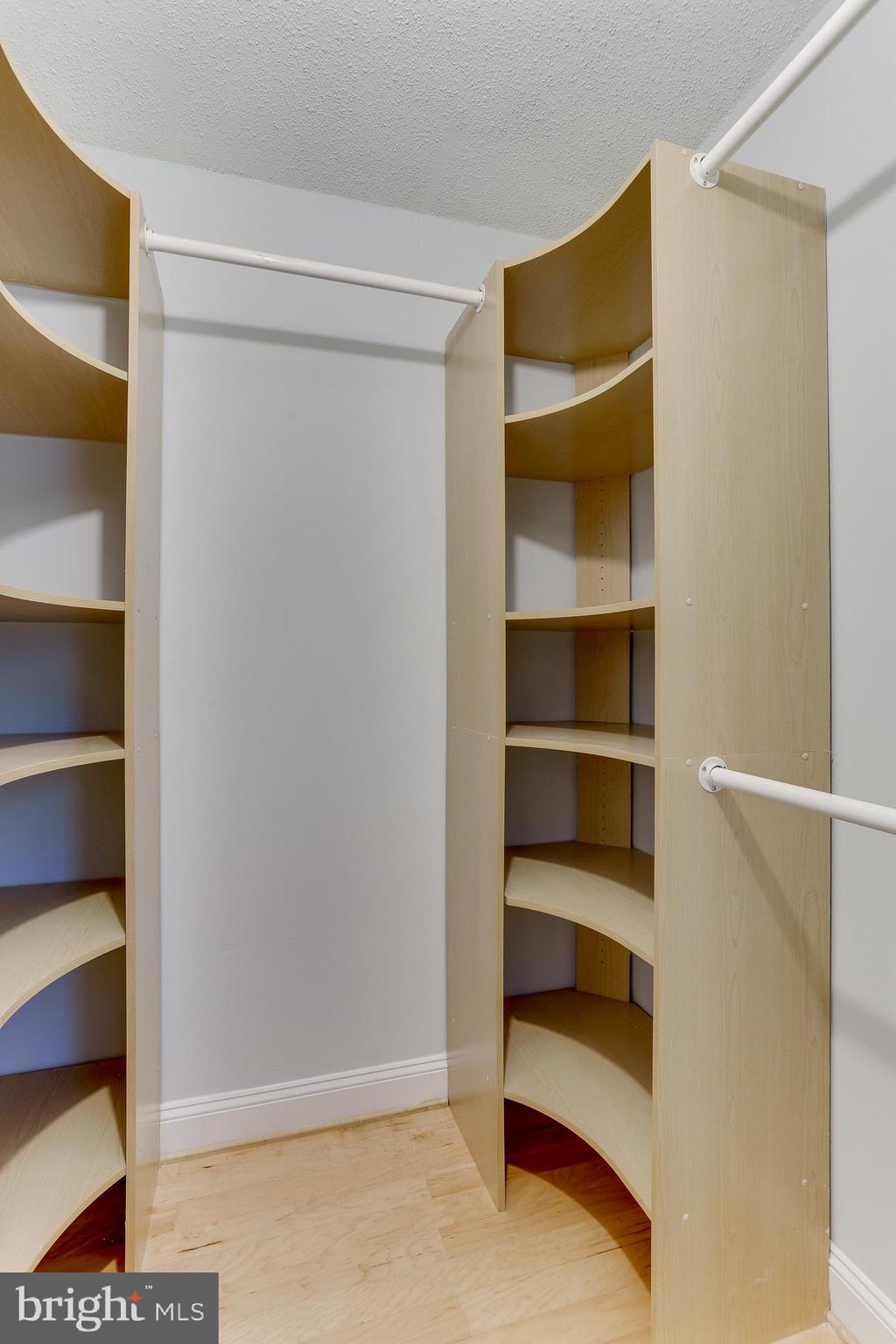 11619 Stoneview Square, Unit 2B Reston, VA 20191 - Photo 25 of 37 Master Bedroom Walk-in Closet