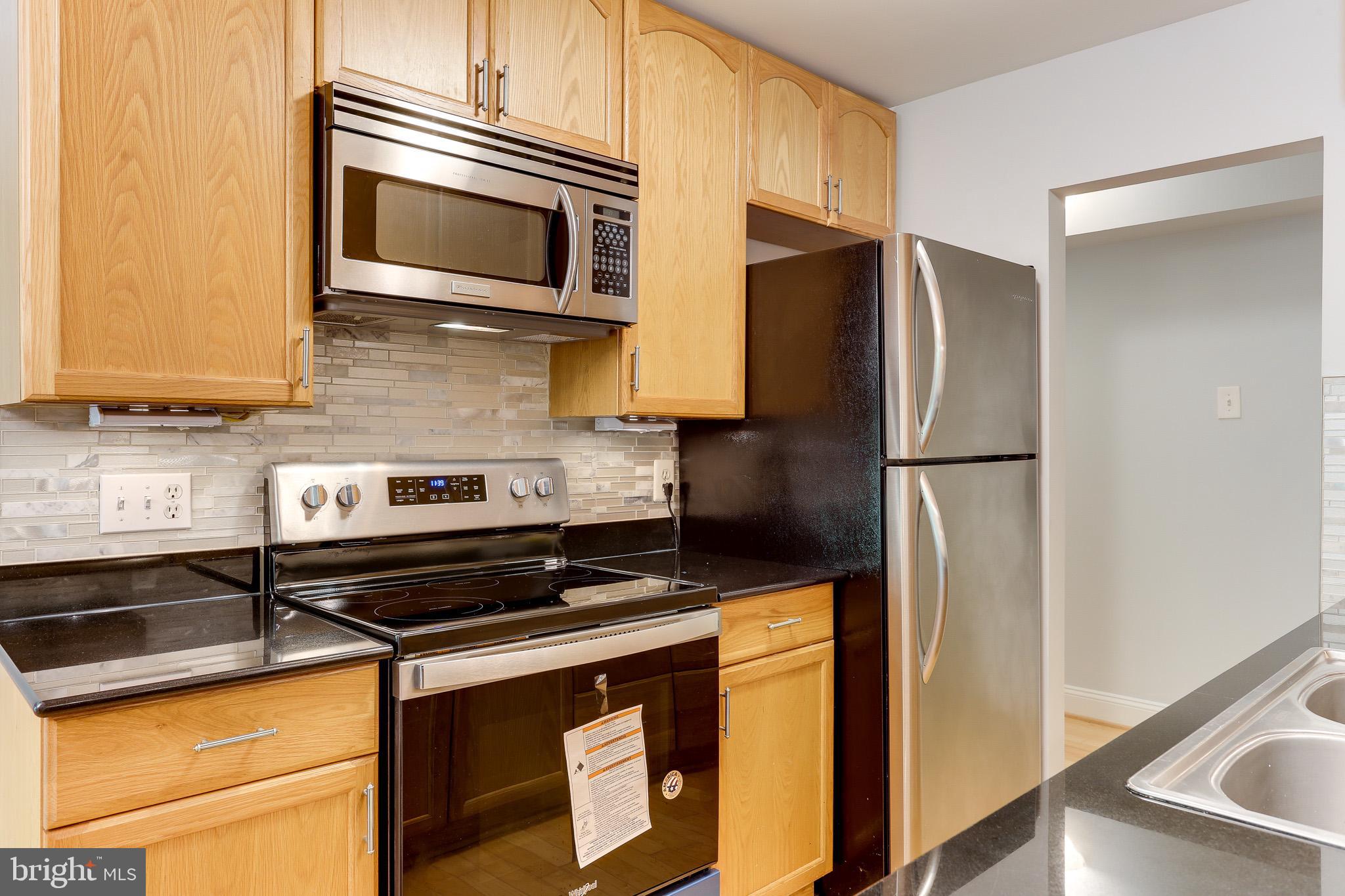 11619 Stoneview Square, Unit 2B Reston, VA 20191 - Photo 9 of 37 Kitchen with Stainless Steel Appliances