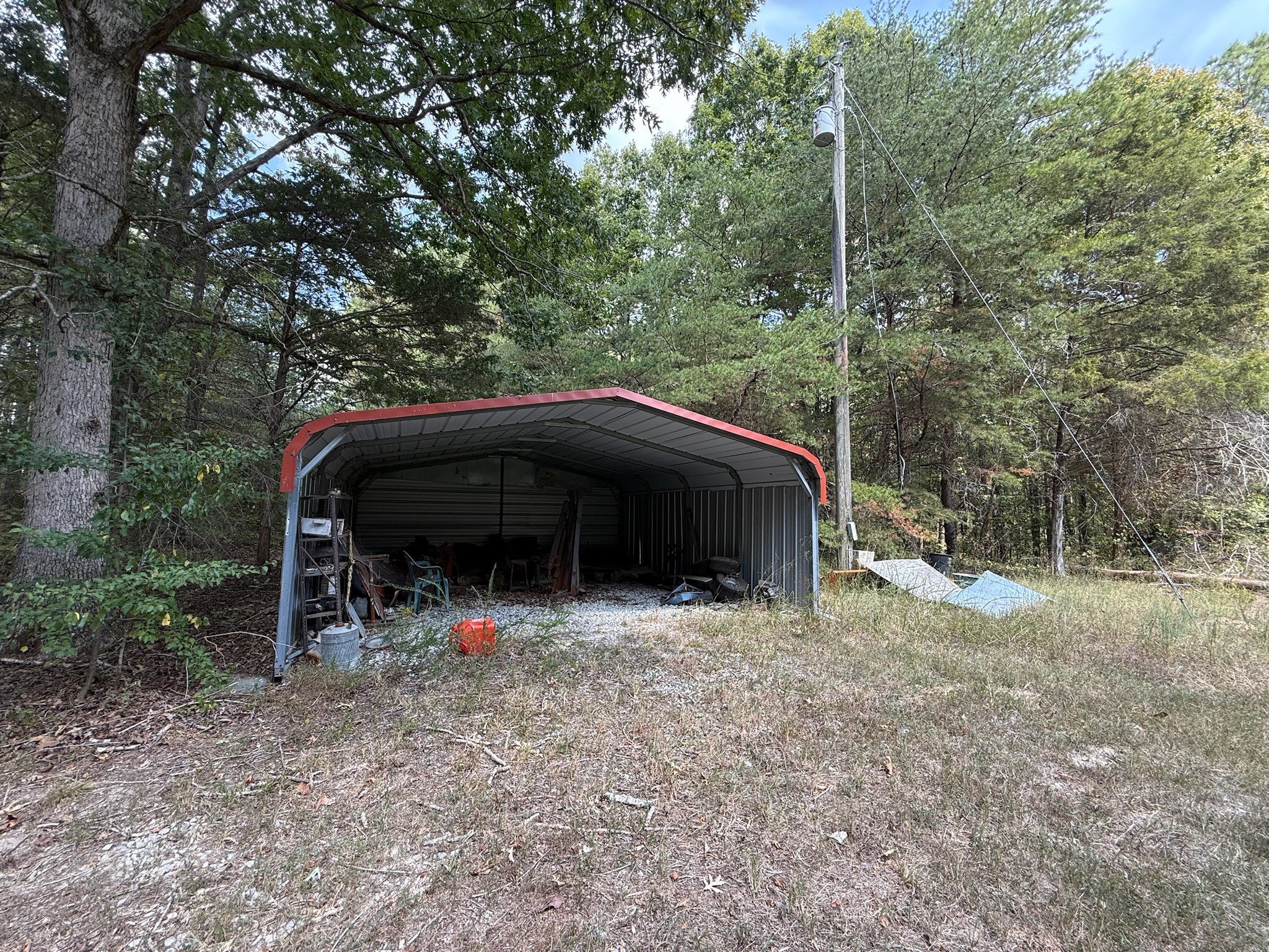 145 Brier Hill Road Ethridge, TN 38456 - Photo 32 of 64 a view of a wooden house with a large trees