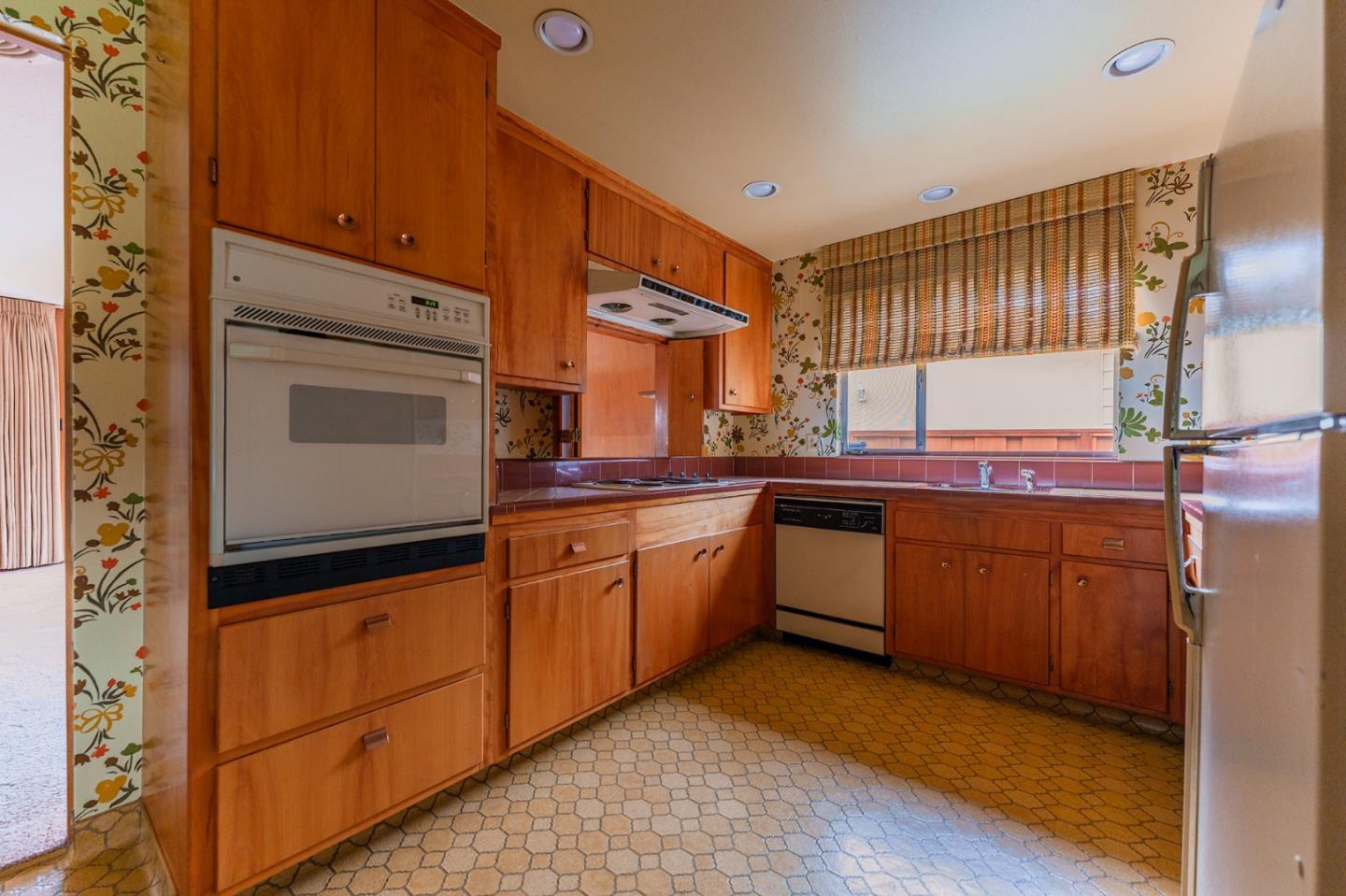 247 Encinada Drive Salinas, CA 93901 - Photo 11 of 26 a kitchen with stainless steel appliances granite countertop a sink stove and cabinets