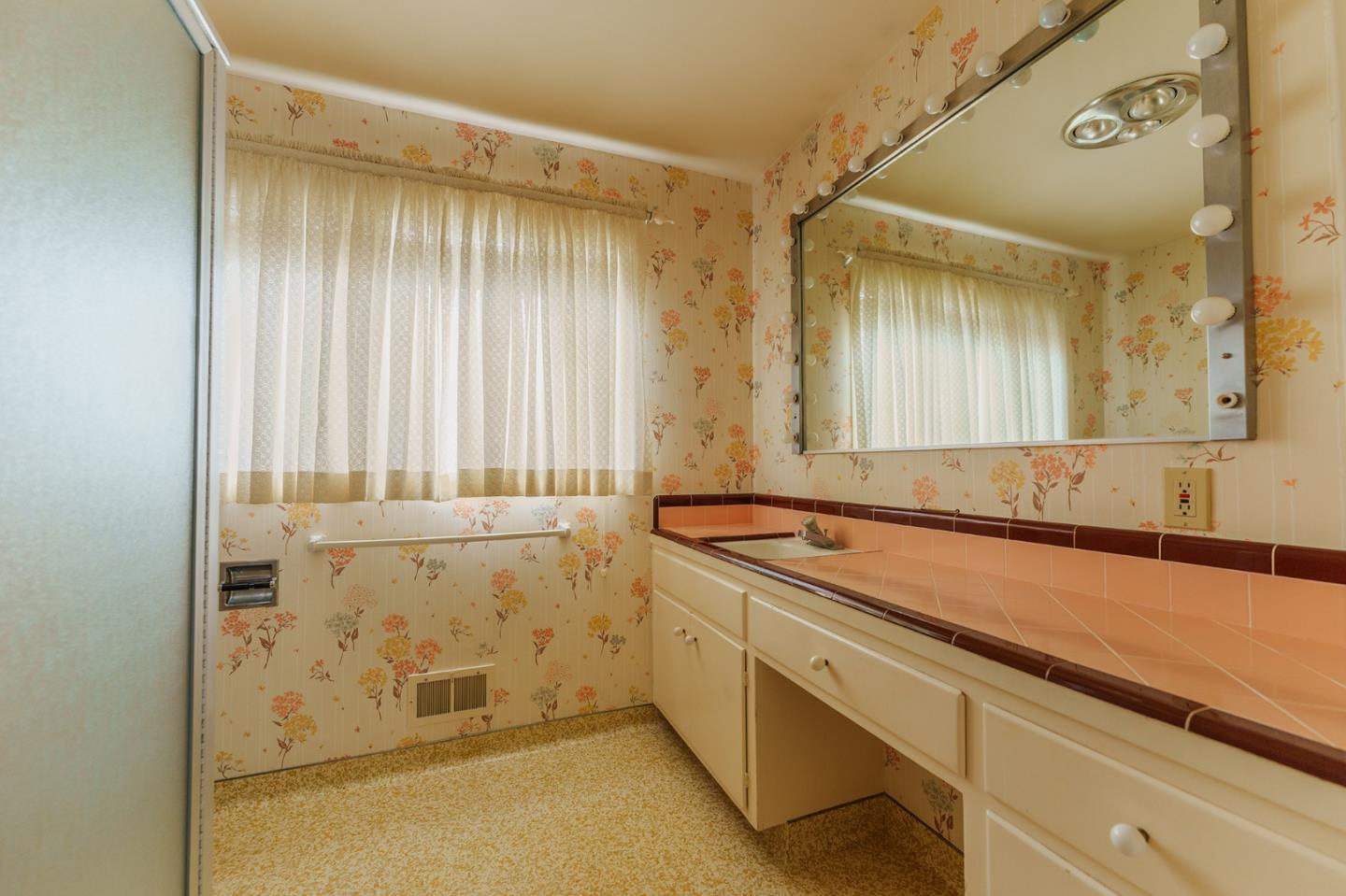 247 Encinada Drive Salinas, CA 93901 - Photo 17 of 26 a bathroom with a sink and a mirror