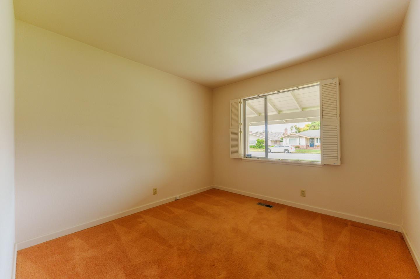 247 Encinada Drive Salinas, CA 93901 - Photo 19 of 26 an empty room with windows