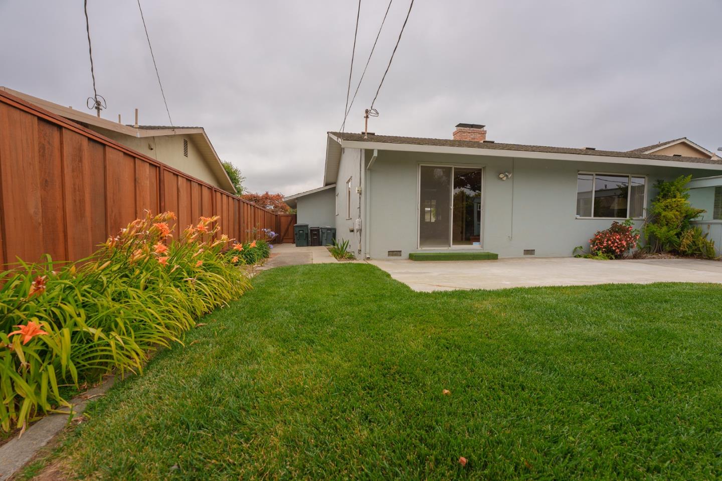 247 Encinada Drive Salinas, CA 93901 - Photo 22 of 26 a view of a backyard with potted plants