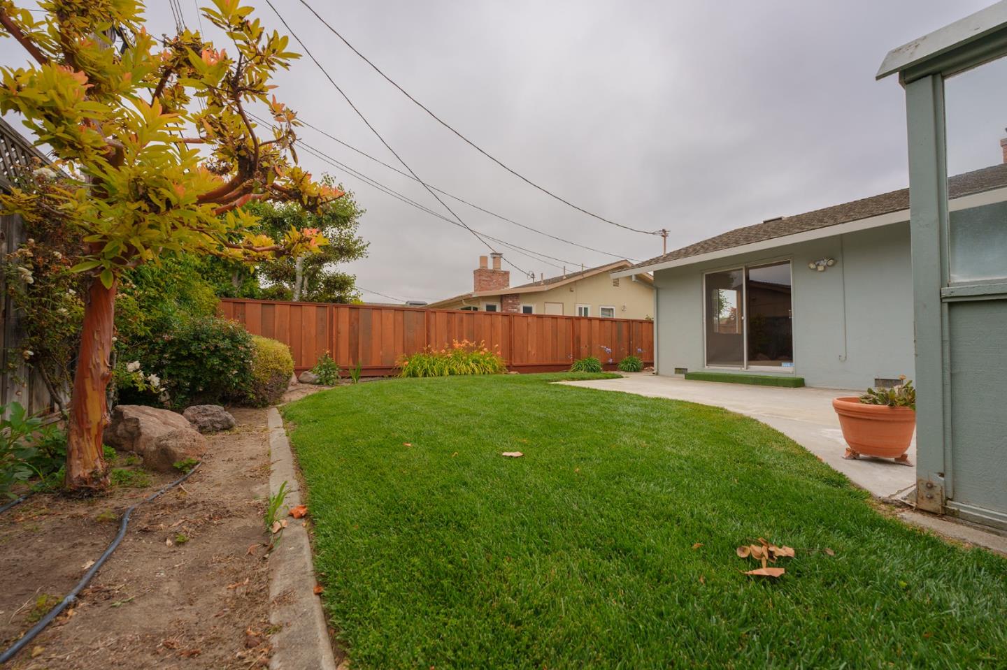 247 Encinada Drive Salinas, CA 93901 - Photo 24 of 26 a front view of a house with garden