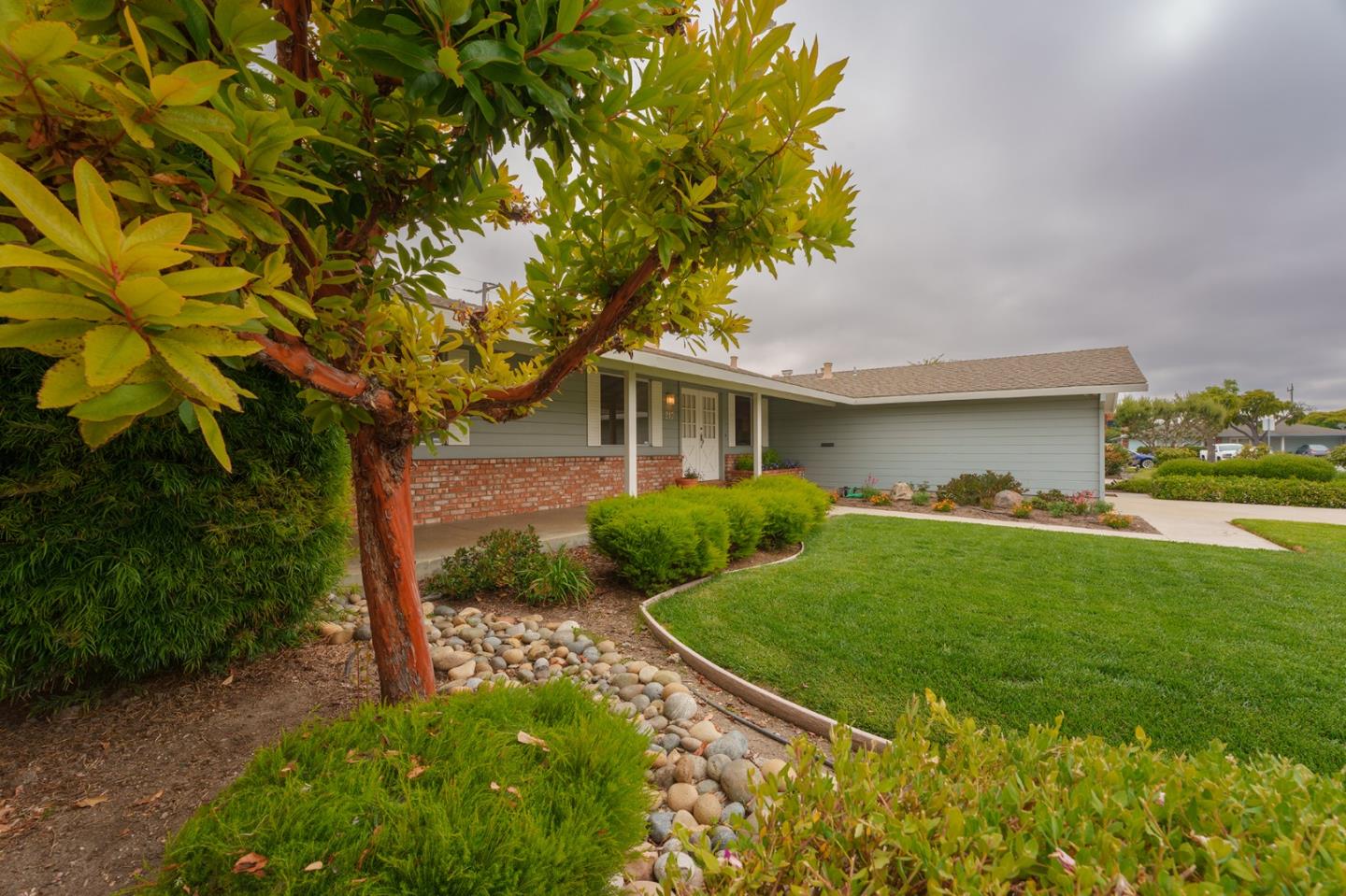 247 Encinada Drive Salinas, CA 93901 - Photo 3 of 26 a view of backyard of house with green space