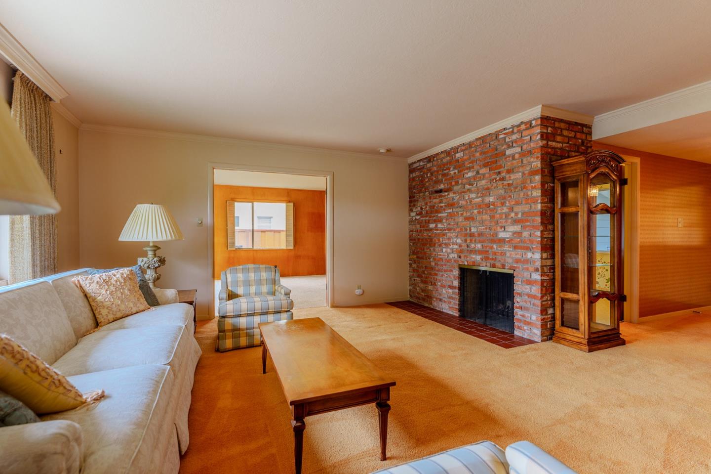 247 Encinada Drive Salinas, CA 93901 - Photo 9 of 26 a bedroom with a bed and a fireplace