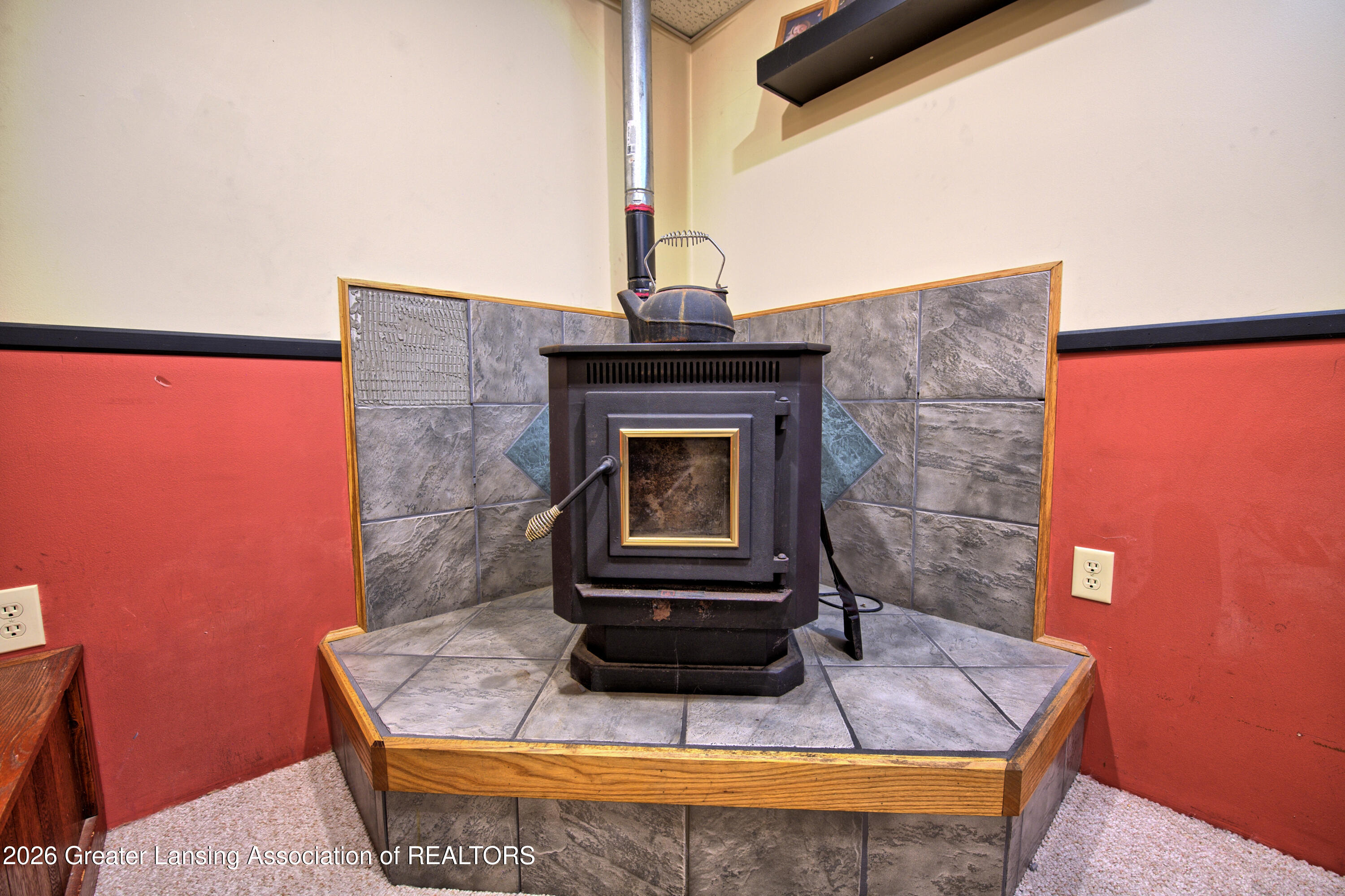 4065 South Lyons Road Lyons, MI 48851 - Photo 27 of 58 Pellet stove