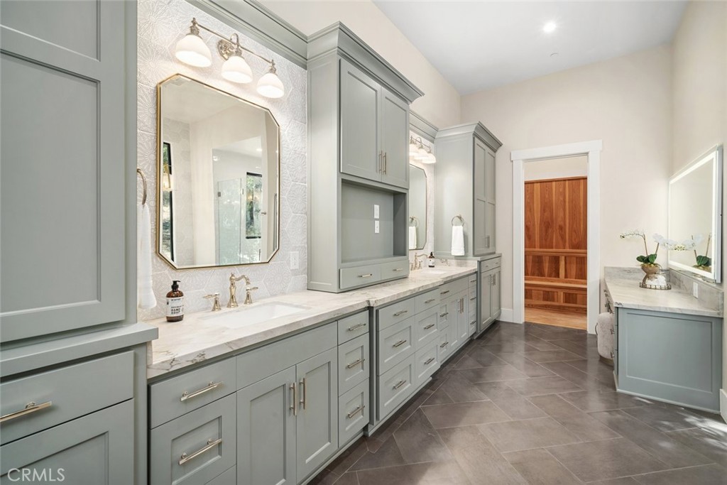 610 Spanish Springs Drive San Luis Obispo, CA 93401 - Photo 31 of 75 a spacious bathroom with a double vanity sink mirror double and bathtub